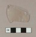 Etched colorless bottle glass fragment