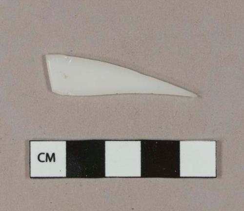 Milk white bottle glass rim fragment