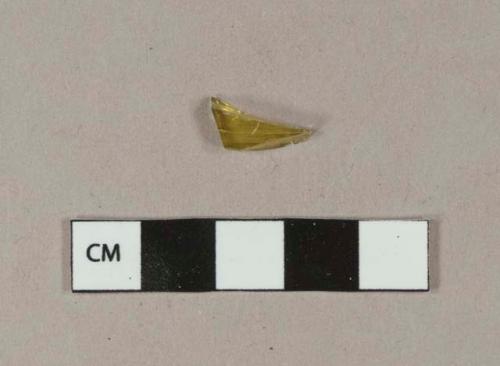 Yellow bottle glass fragment