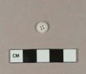 Undecorated white porcelain four-hole inkwell button