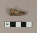 Coal fragment adhered to unidentified iron nail fragment