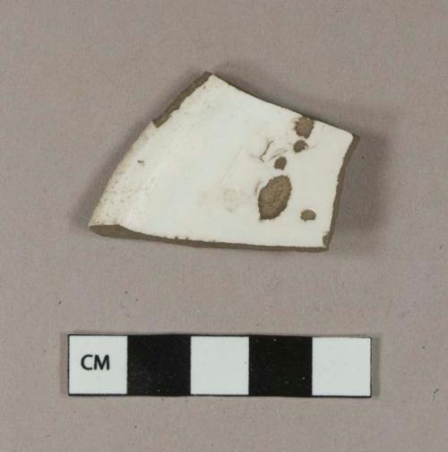 Undecorated whiteware base sherd