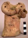 Figurine, portion, pottery