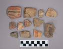 Ceramic, earthenware body, rim, and base sherds with red and black painted on exterior and interior