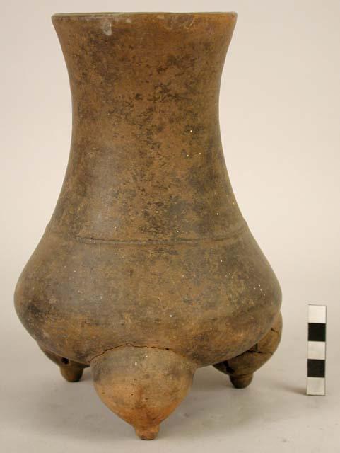 Chocolate brown tripod pottery jar