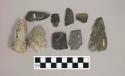 Chipped stone, broken projectile points, bifaces, and one ceramic earthenware body sherd