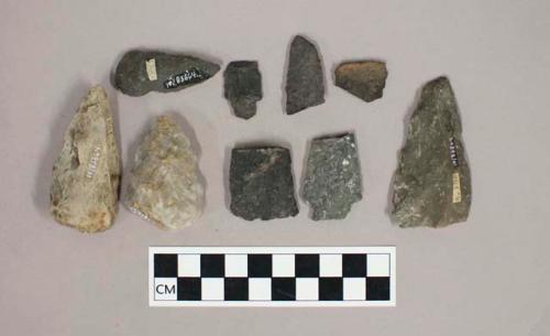 Chipped stone, broken projectile points, bifaces, and one ceramic earthenware body sherd