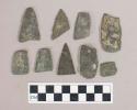 Chipped stone, broken projectile point and biface fragments