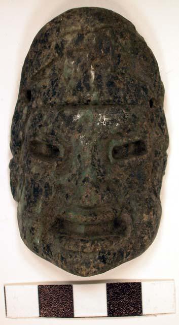 Amulet, human head