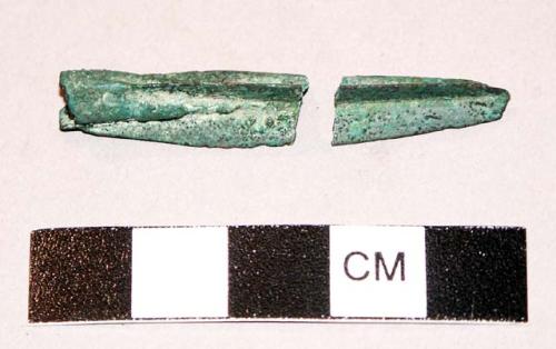 Patinated bronze arrowhead with three flanges ( or ribs) and a socket for attach