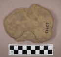 Ground stone tool