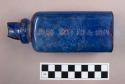 Blue glass medicine bottle; logo on side: "John Wyeth & Bro."