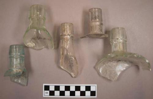 Miscellaneous bottle neck pieces, clear glass