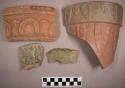 Miscellaneous rim sherds from mold-made earthenware pots. raised design--some p