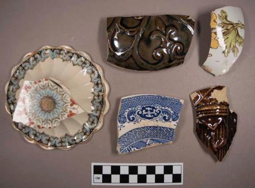 Miscellaneous body and base sherds from household dinner ware. all are glazed,