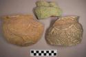 Miscellaneous painted and unpainted mold made rim sherds with raised design