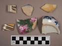 Miscellaneous body sherds. various pottery types, some with design.