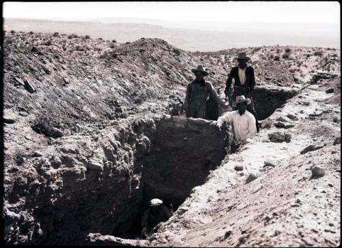 Trench, 3 workmen in Room 10