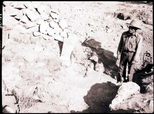 Jacob Chong Poleviyuma standing, with "Garden View" from SW