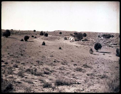 Camp with Awatovi in central background