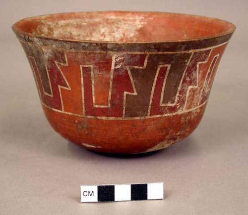 Bowl painted in polychrome with geometric, curving fret motifs