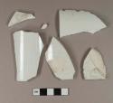 Undecorated whiteware body sherds; five sherds crossmend, two glued together; three sherds crossmend, two glued together; five sherds crossmend with undecorated whiteware base/body/handle sherd and associated glued sherds, one undecorated whiteware body sherd, and undecorated whiteware rim/handle sherd