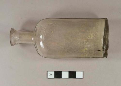 Colorless glass bottle, mold blown with cup-mold base and prescription finish