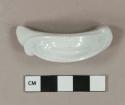 White pearlware handle fragment, molded decoration, white paste