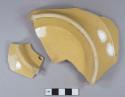 Undecorated yellowware earthenware vessel base fragments, buff paste