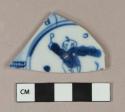 Blue on white handpainted chinese trade porcelain vessel body fragment, pattern with a human figure, white paste