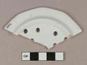 White undecorated ironstone 12-sided strainer fragment, white paste