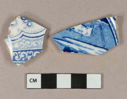 Blue on white transferprinted lead glazed earthenware vessel base fragments, white or light buff paste