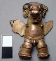 Gold plated copper anthropomorphic figurine - mounted on glass