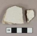 White plaster fragments, 1 side smooth