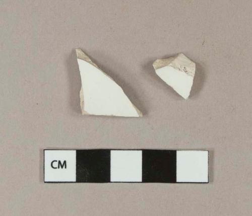 Undecorated whiteware body sherds; two sherds crossmend; two sherds crossmend with blue hand painted whiteware bowl partial vessel