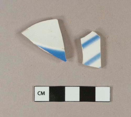 Blue hand painted whiteware body sherds; one sherd crossmends with blue hand painted whiteware rim sherd