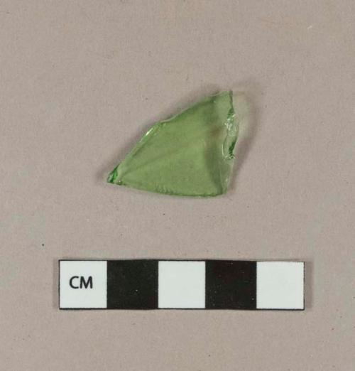 Molded green bottle glass fragment