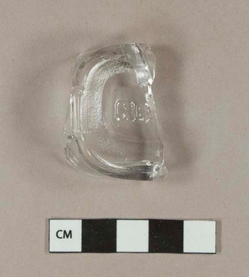 Colorless bottle glass base fragment, embossed with "CLE"