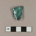 Aqua bottle glass rim fragment; irregular rim, possibly hand-blown