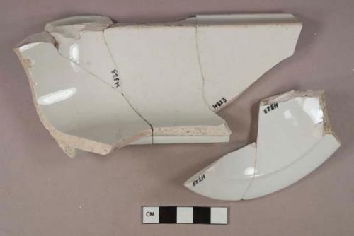 White undecorated tureen and vessel rim fragments, white paste