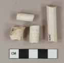 White kaolin pipe stem fragments, 1 fragment with rouletted decoration, 1 with 5/64" bore diameter, 1 with 6/64" bore diameter, 2 with 7/64" bore diameter