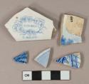 Blue on white transferprinted earthenware vessel body and rim fragments, white paste, 1 rim fragment with stamp in flower and leaves wreath "TIVOLI / C. MEIGH"