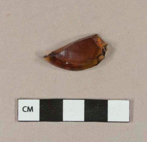 Glass, amber bottle glass base fragment