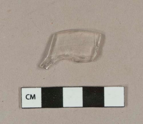 Colorless glass fragment, possibly the base of a stemware