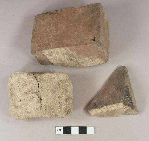 Brick fragments with mortar attached