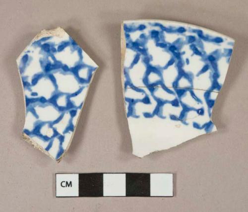 Blue on white sponge decorated pearlware vessel rim fragments, white paste