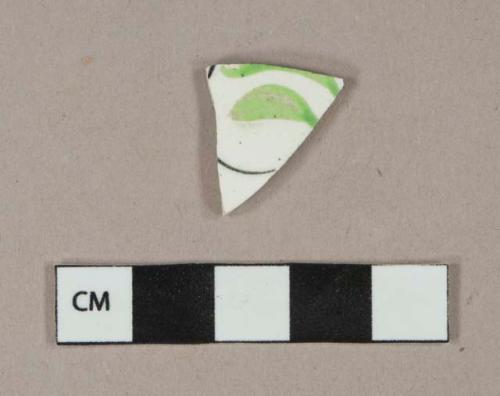 Handpainted polychrome pearlware vessel body fragment, white paste