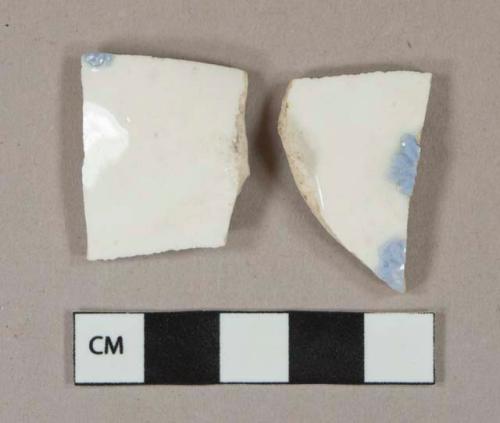 White porcelain vessel body fragment, light blue applied decoration, white paste