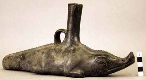 Ceramic bottle, animal effigy, alligator, molded, incised, 1 strap handle