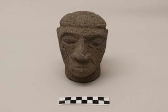 Stone effigy, man's head